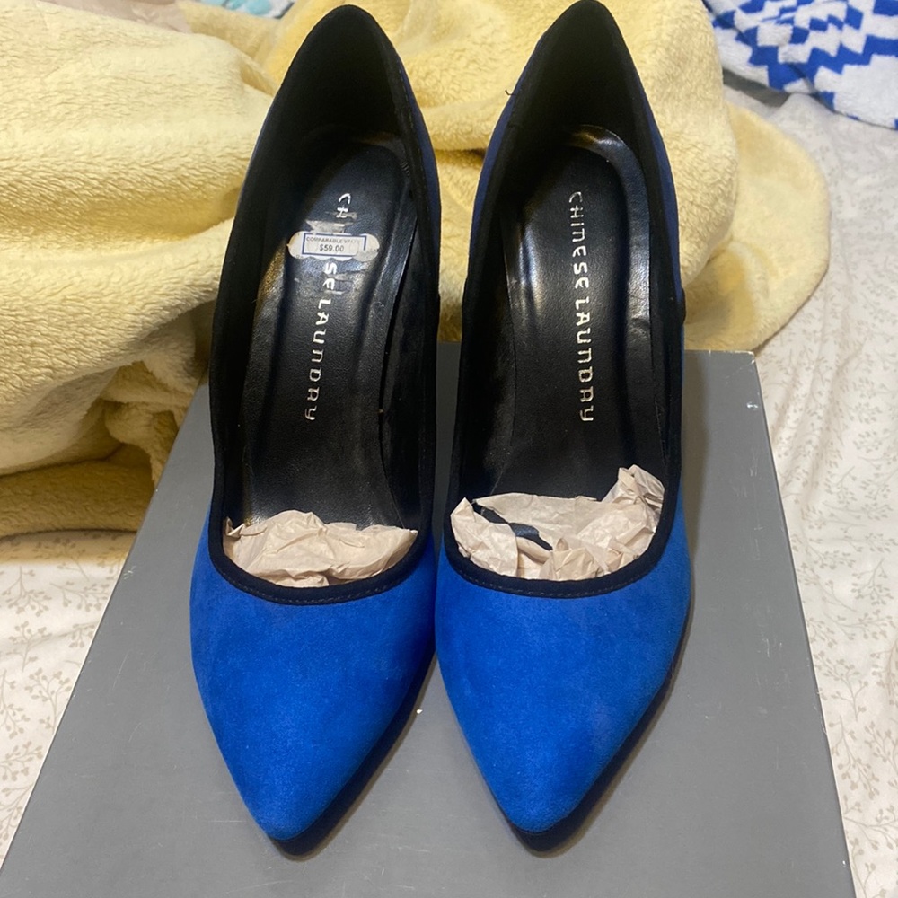 Indigo color and royal blue color. New, never worn high heels. Size 8.